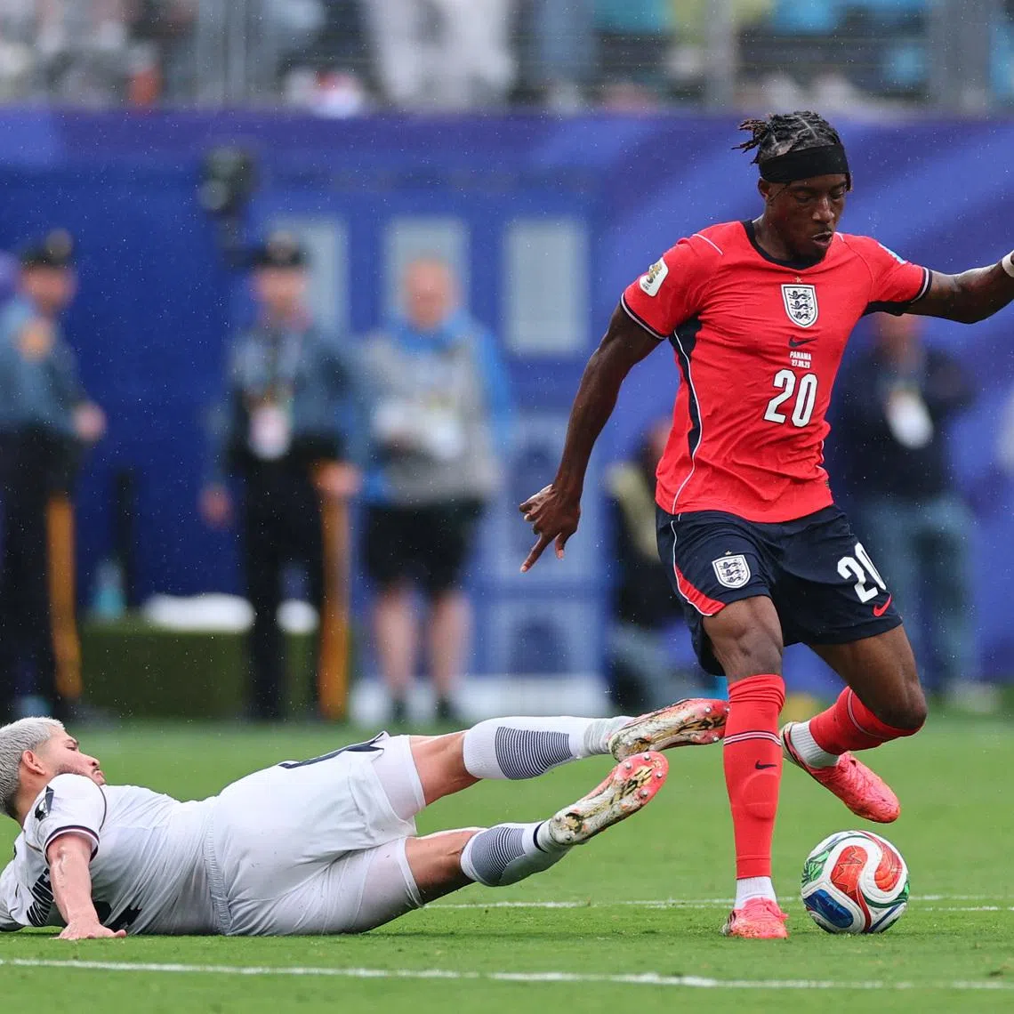 Jun 27, 2026; East Rutherford, New Jersey, USA; England forward Noni Madueke (20) plays the ball against Panama defender Michael Amir Murillo (23) during a Group L match of the 2026 FIFA World Cup at New York New Jersey Stadium. Mandatory Credit: Vincent Carchietta-Imagn Images
