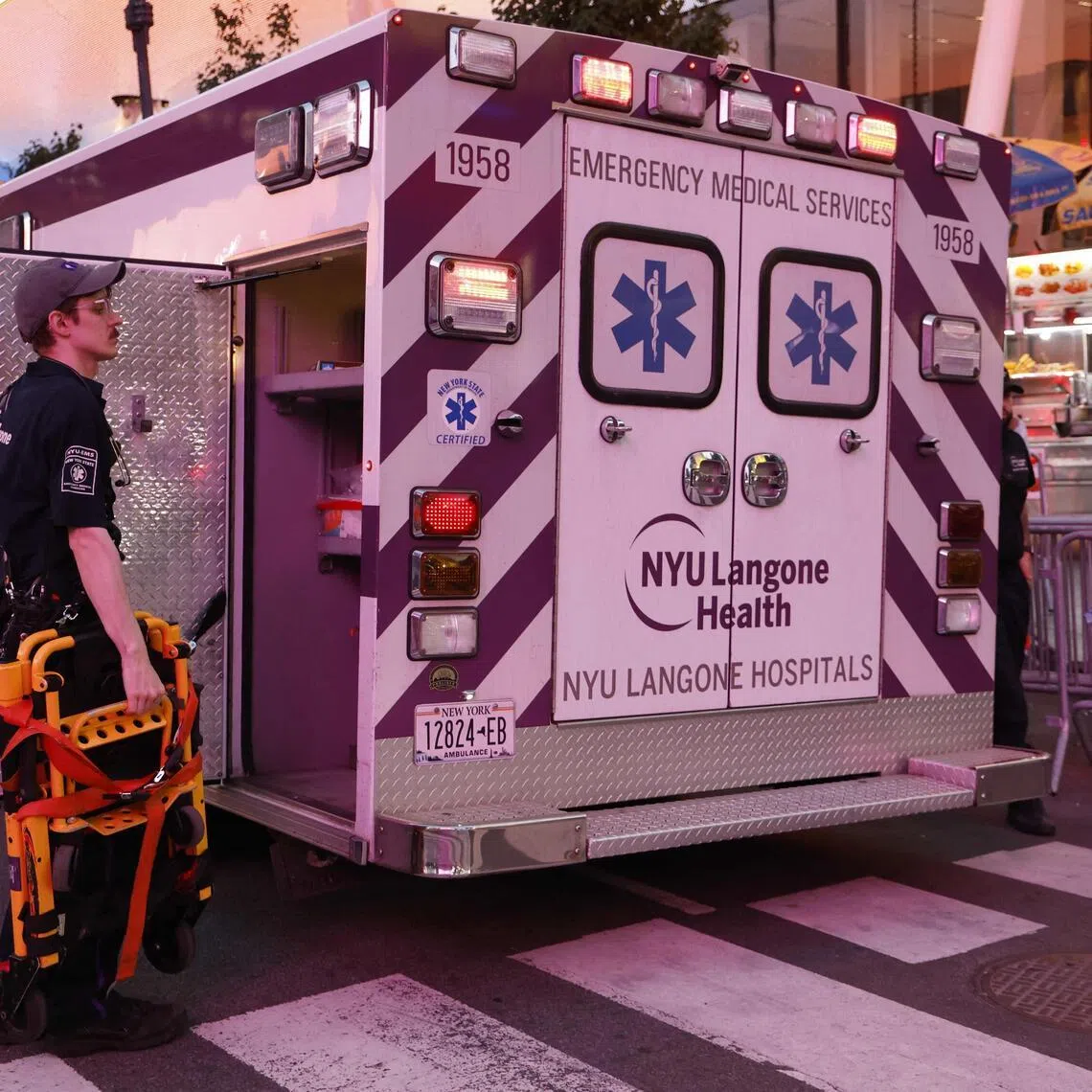 An ambulance is seen outside Penn Station in New York on June 7, 2026.  