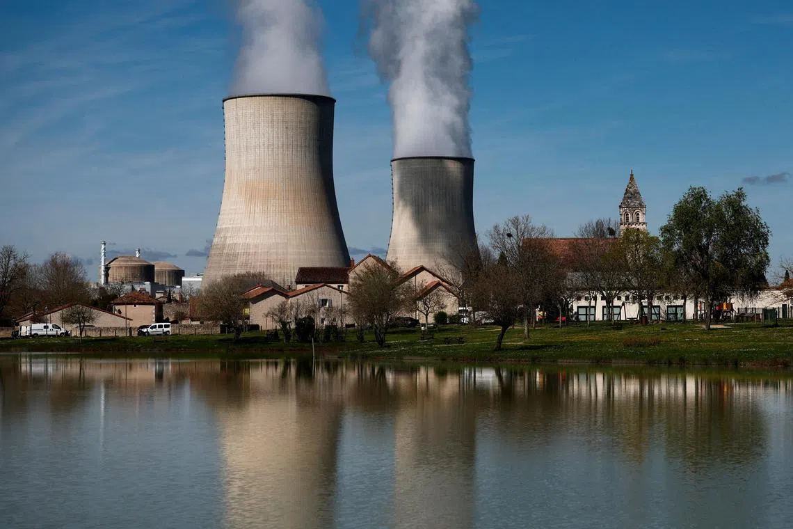 Steam rises from the cooling towers of a nuclear power station in Civaux, France.
