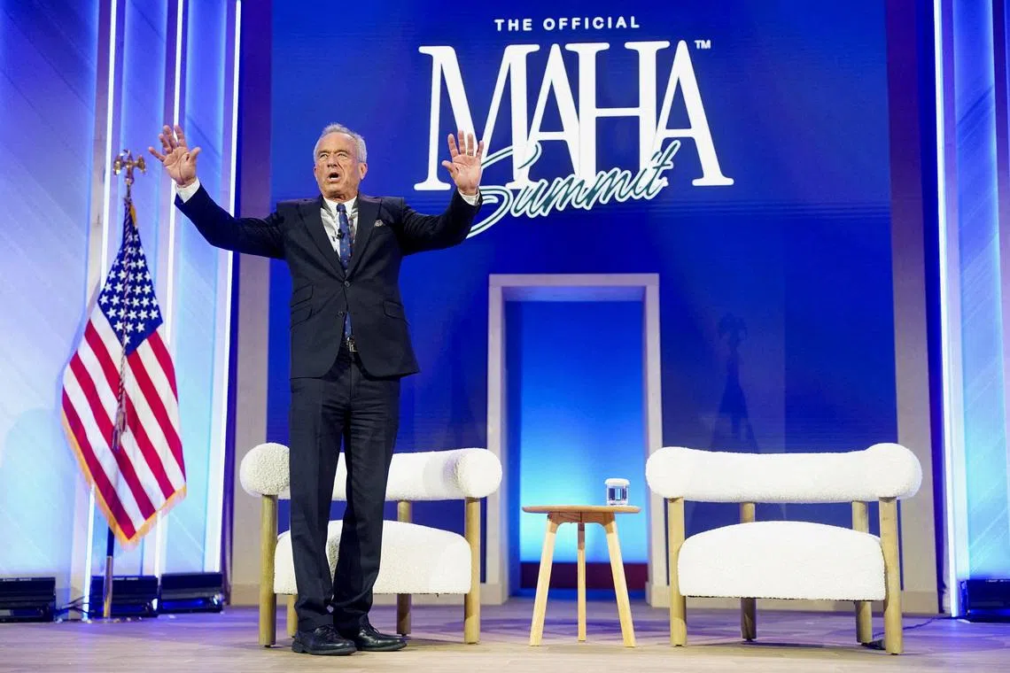 FILE PHOTO: U.S. Secretary of Health and Human Services Robert F. Kennedy Jr. gestures as he speaks during the inaugural Make America Healthy Again (MAHA) summit in Washington, D.C., U.S., November 12, 2025. REUTERS/Nathan Howard/File Photo