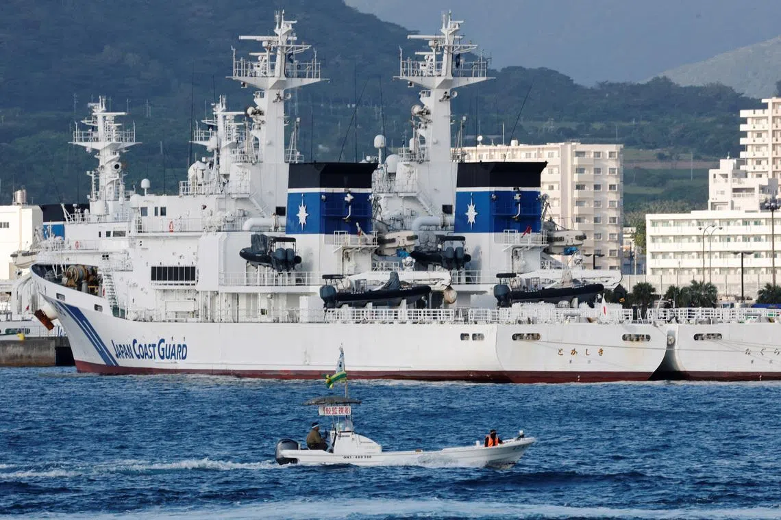 Japan Coast Guard ships are docked at a port in Ishigaki, Okinawa Prefecture, Japan, on Jan 13.