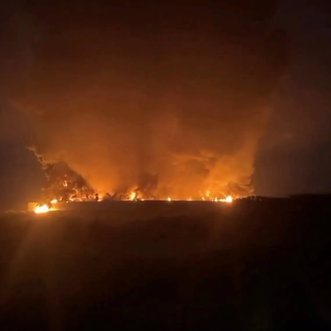 Smoke rises from fire at logistics hub of top Russian online retailer Wildberries, from what Tula regional governor Dmitry Milyayev says is after a Ukrainian drone attack, in Tula Region, Russia, August 5, 2026 in this screengrab taken from a social media video. SOCIAL MEDIA/via REUTERS