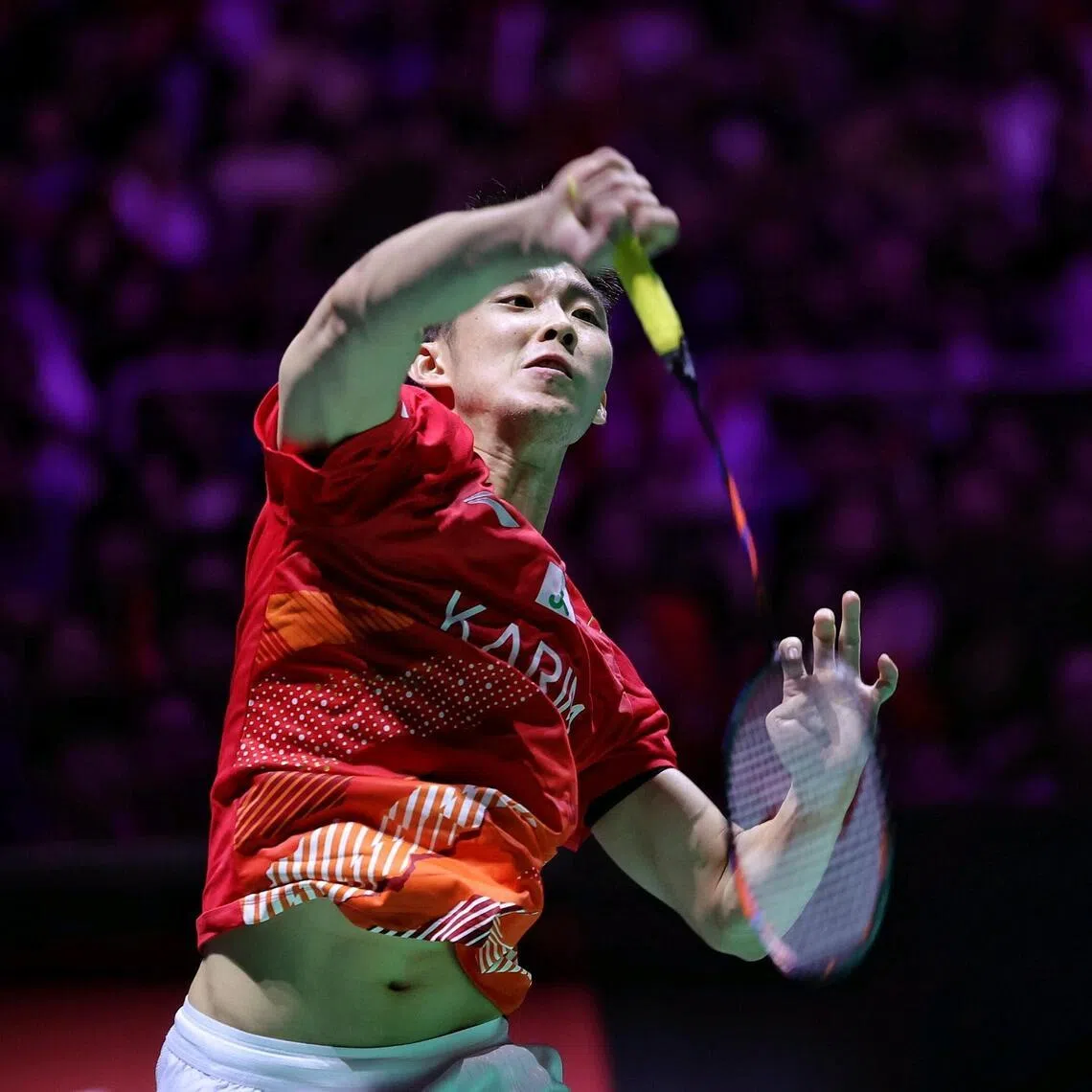 Singapore's Loh Kean Yew in action against France's Alex Lanier in the men's singles final of the KFF Singapore Badminton Open at Singapore Indoor Stadium on May 31.