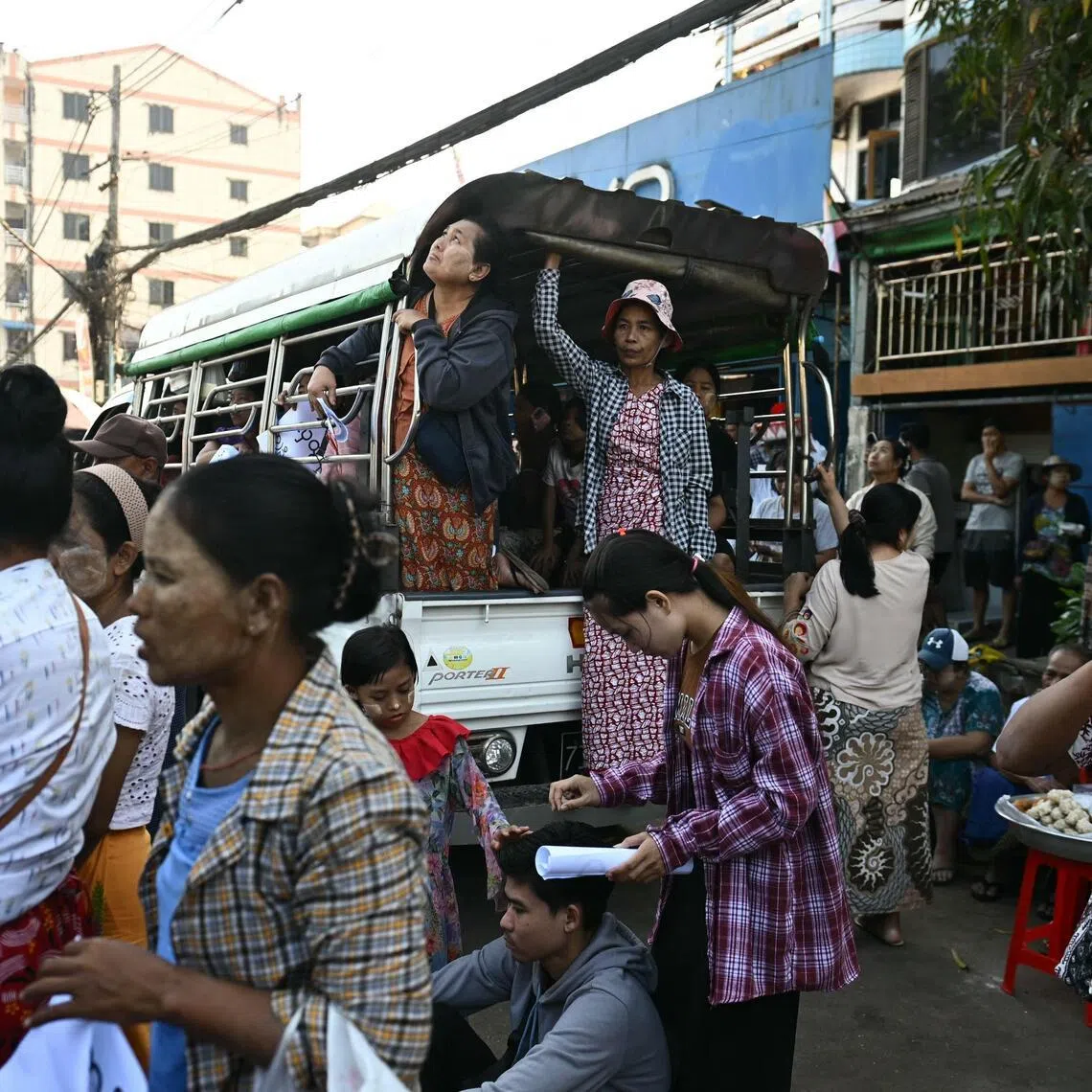 Relatives wait for prisoners to be released during an annual amnesty to mark Myanmar's independence day outside Insein prison in Yangon on Jan 4, 2026.