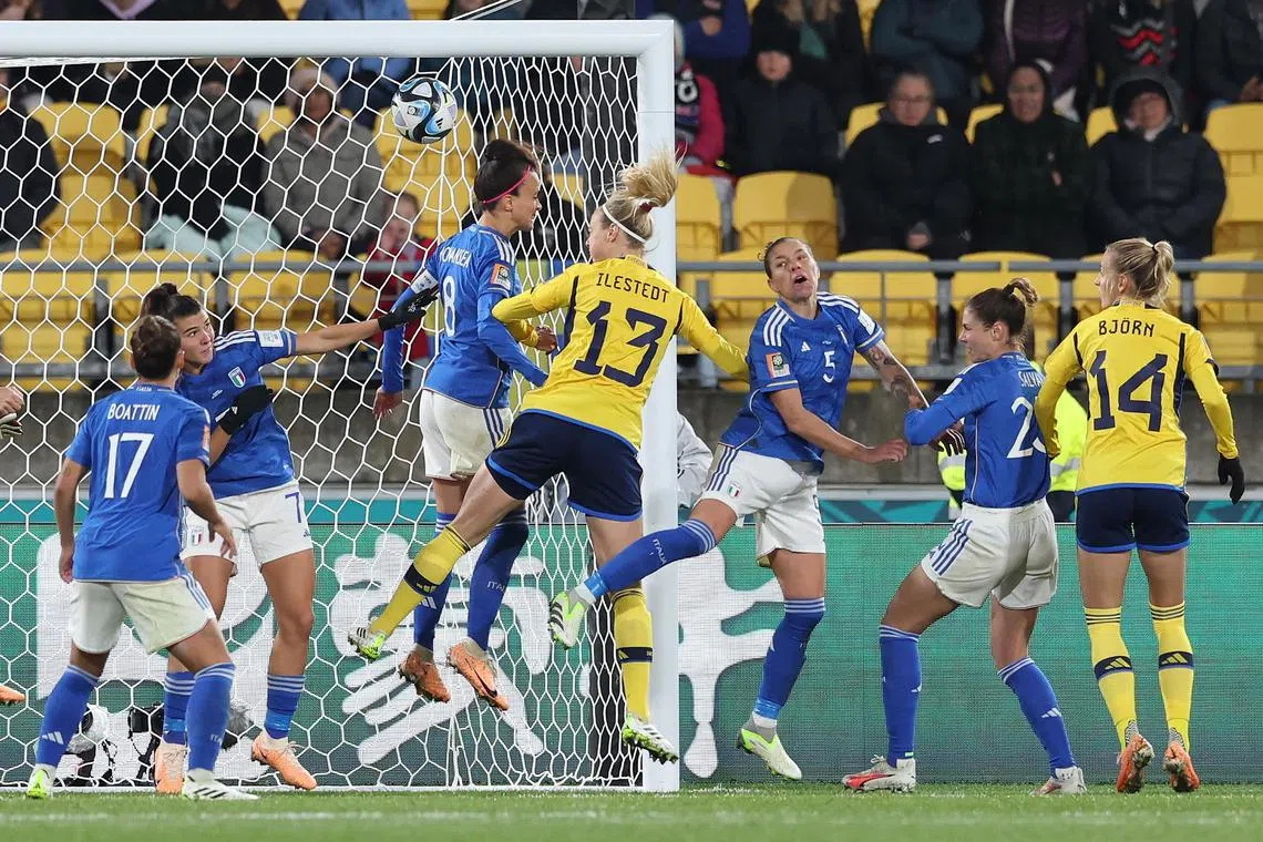 Amanda Ilestedt of Sweden scores her second goal as the Swedes beat Italy 5-0 to qualify for the last 16 of the Women's World Cup.
