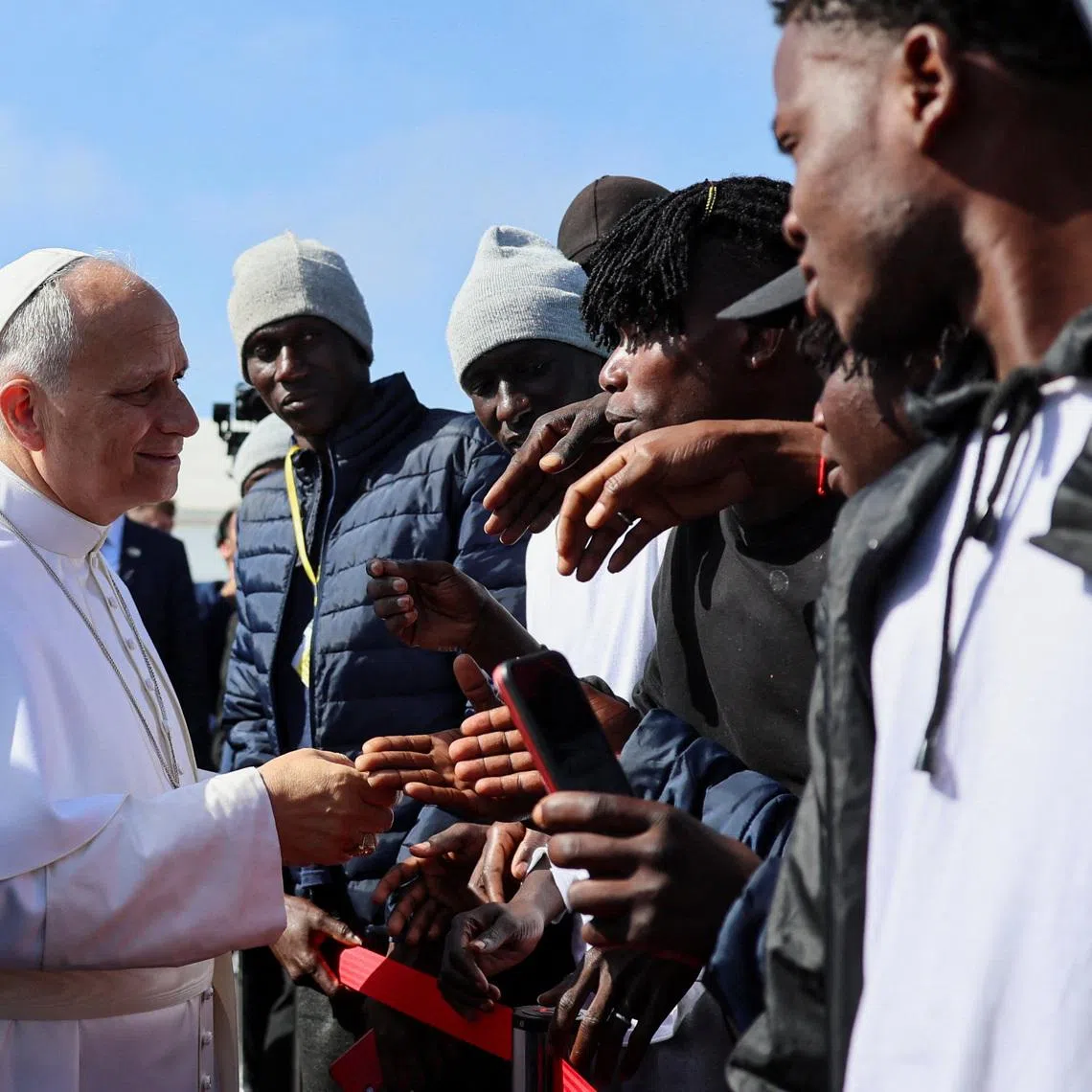 Pope Leo XIV greets migrants at the \"Las Raices\" migrant center in San Cristobal de La Laguna, Tenerife, Canary Islands, Spain, June 12, 2026, where he is meeting migrants and humanitarian organizations, as part of a seven-day apostolic journey to Spain, with visits to Madrid, Barcelona and the Canary Islands. REUTERS/Yara Nardi