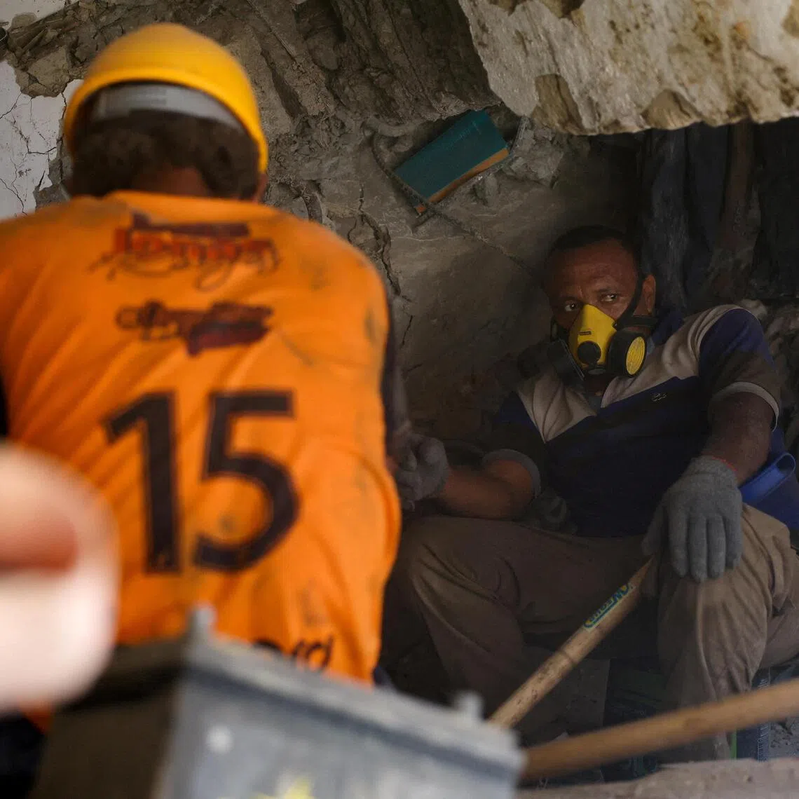 Nearly two months since the disaster, relatives and rescuers continue searching for the missing amid the rubble.