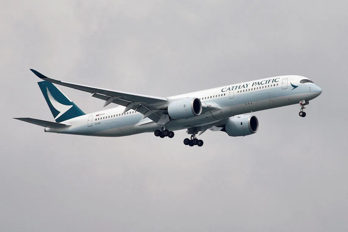 Cathay Pacific said it aimed to make a return to full pre-pandemic passenger flight capacity by the end of 2024.