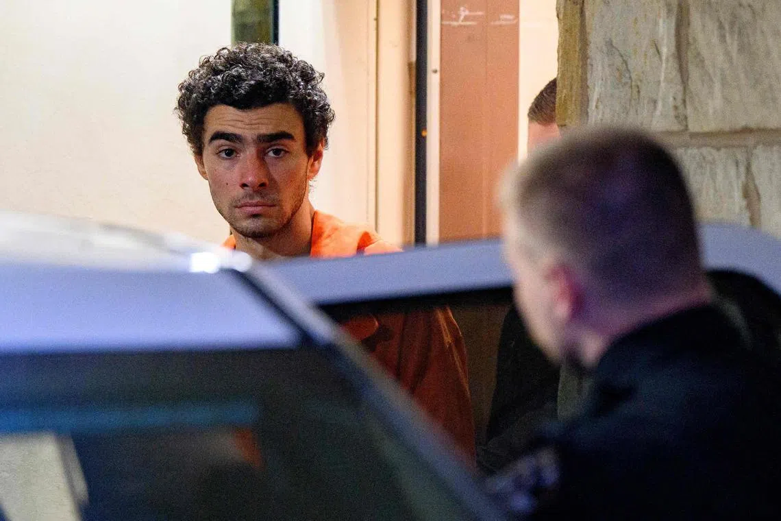 HOLLIDAYSBURG, PENNSYLVANIA - DECEMBER 10: Suspected shooter Luigi Mangione is led from the Blair County Courthouse after an extradition hearing December 10, 2024 in Hollidaysburg, Pennsylvania. Mangione has been arraigned on weapons and false identification charges related to the fatal shooting of United Healthcare CEO Brian Thompson in New York City. Mangione is incarcerated in the State Correctional Institution in Huntingdon, Pennsylvania awaiting extradition to New York.   Jeff Swensen/Getty Images/AFP (Photo by JEFF SWENSEN / GETTY IMAGES NORTH AMERICA / Getty Images via AFP)