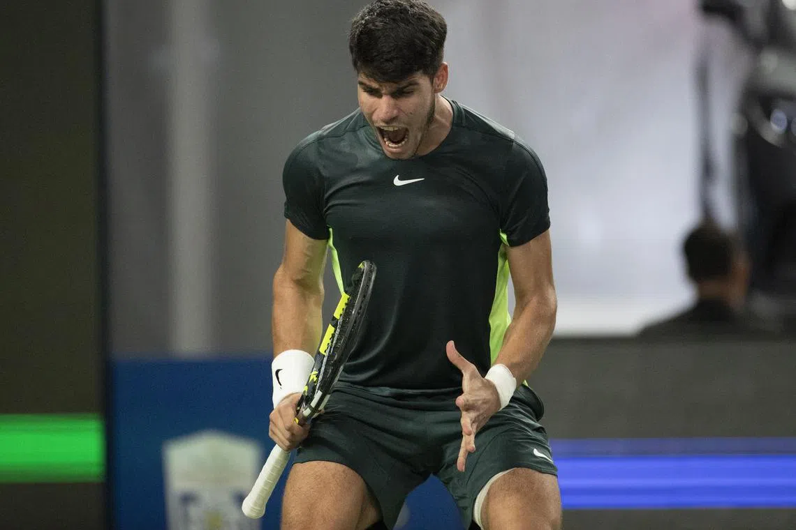 World No. 2 Carlos Alcaraz of Spain celebrating after winning his match against Daniel Evans of Britain at the Shanghai Masters tennis tournament on Monday.