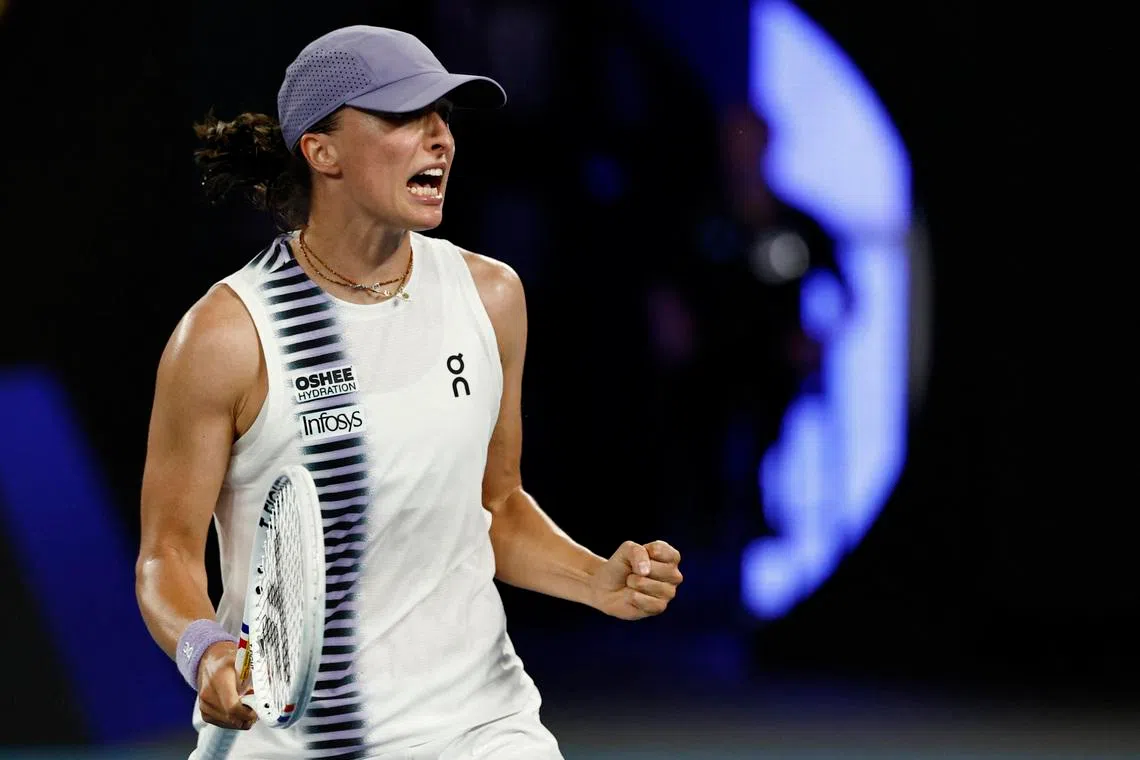 Tennis - Australian Open - Melbourne Park, Melbourne, Australia - January 19, 2026 Poland's Iga Swiatek celebrates after winning her first round match against China's Yue Yuan REUTERS/Tingshu Wang