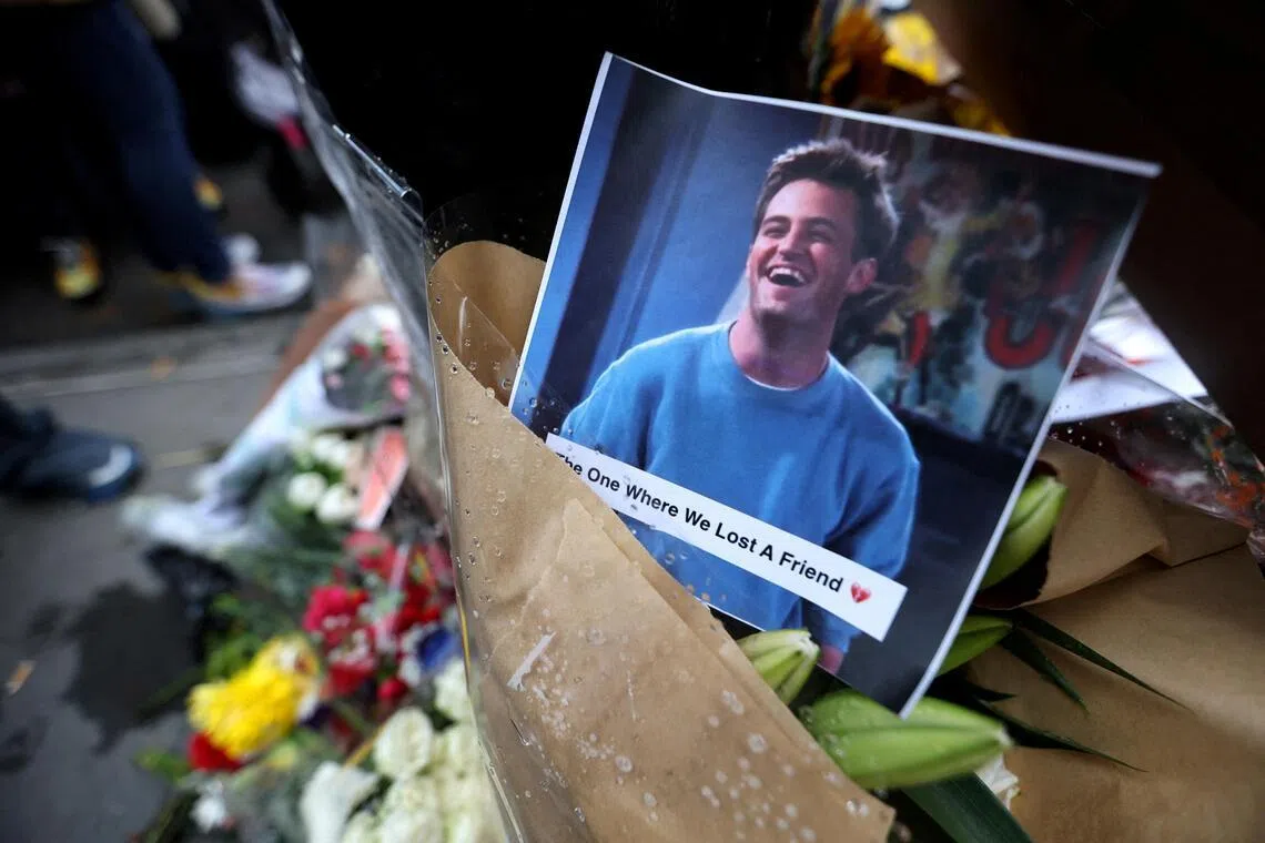 A 2023 photo shows a makeshift memorial for actor Matthew Perry, who was found dead at his Los Angeles home after drowning in his hot tub.