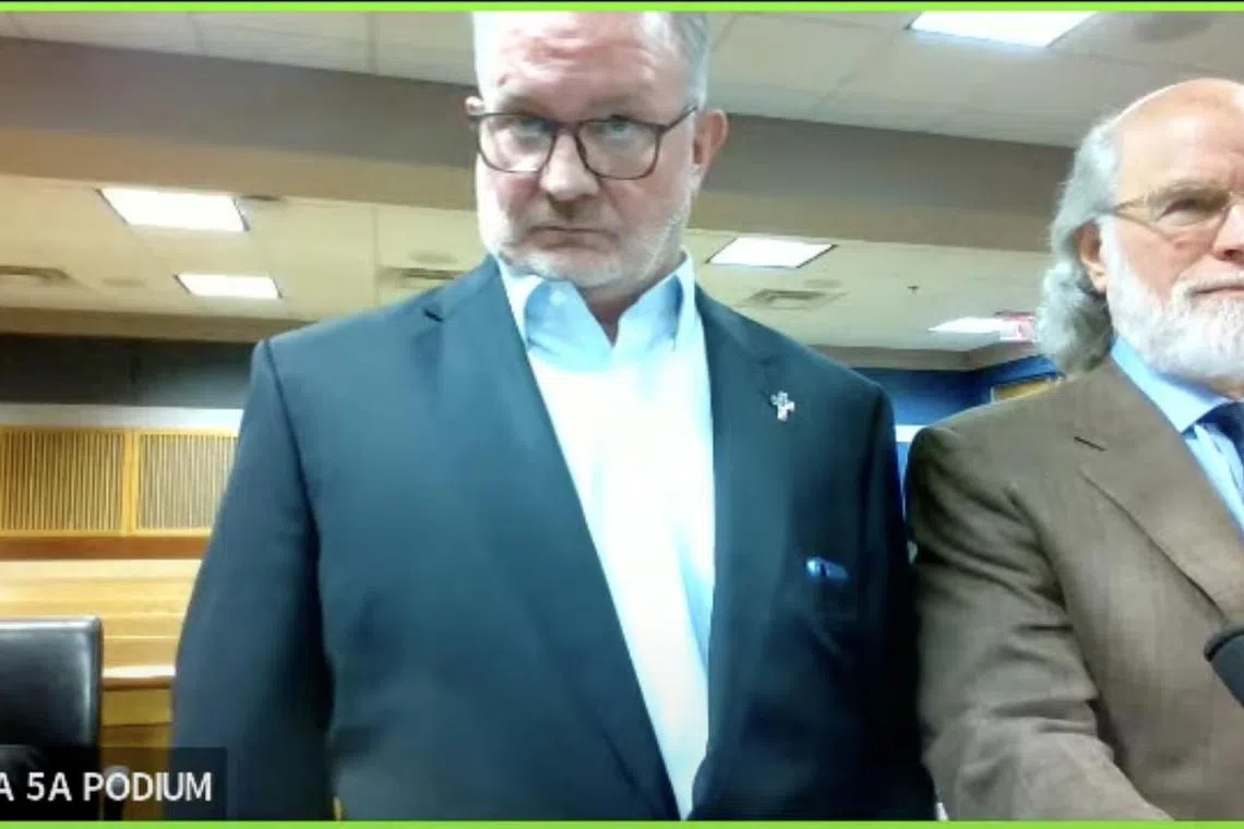 Scott Hall has been charged with racketeering, as well as six other felonies, for helping to carry out a breach of voting equipment and data at the elections office in rural Coffee County, Georgia, in January 2021. 