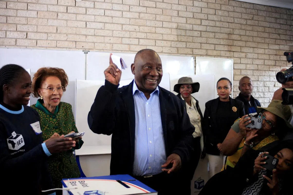 FILE PHOTO: South African president Cyril Ramaphosa casts his vote during the South African elections in Soweto, South Africa May 29, 2024 REUTERS/Oupa Nkosi/File Photo