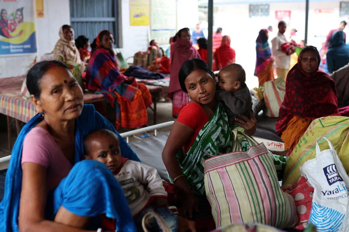 Patients waiting outside a primary health care centre in Belwa village, Kishanganj district on March 20.        