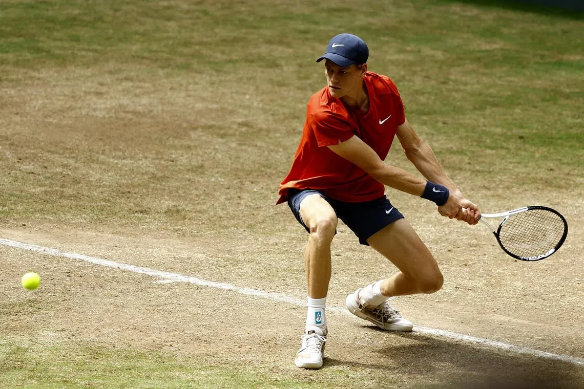 Tennis - Halle Open - OWL Arena, Halle, Germany - June 23, 2024 Italy's Jannik Sinner in action during the final against Poland's Hubert Hurkacz REUTERS/Leon Kuegeler