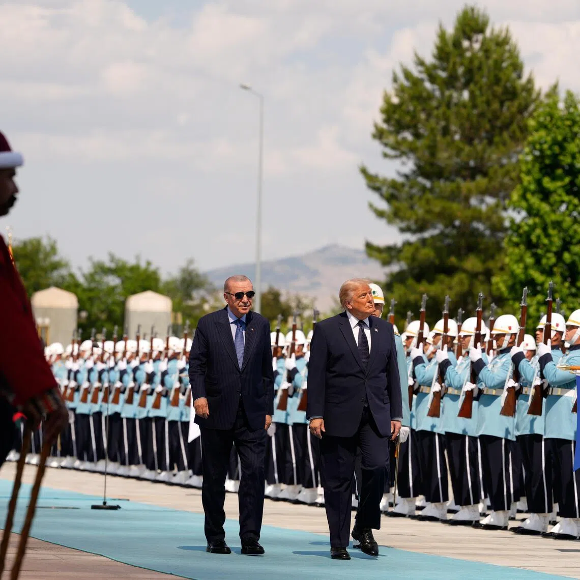 Turkish President Recep Tayyip Erdogan (left) welcomes US President Donald Trump upon his arrival at the Bestepe Presidential Palace on July 7.