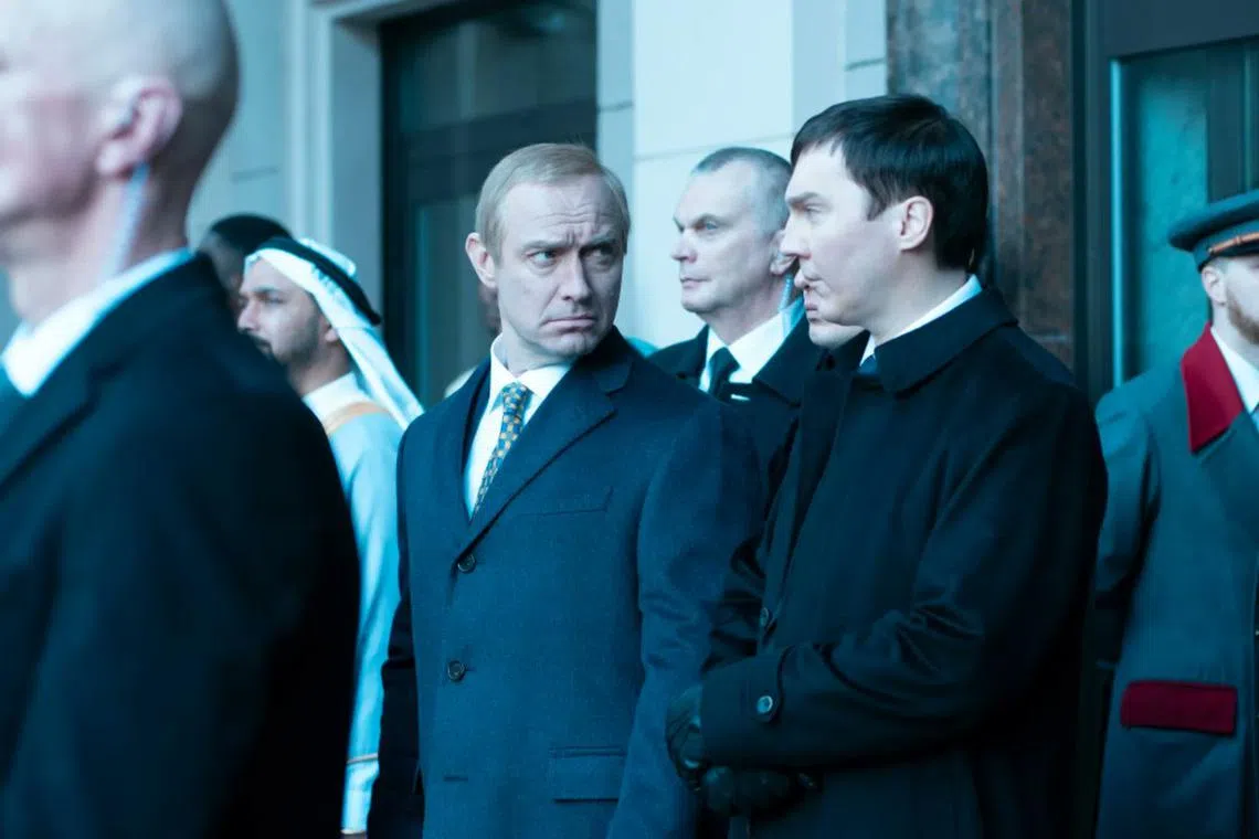 British actor Jude Law (left) as Russian leader Vladimir Putin, and Paul Dano as Vadim Baranov, in a scene from The Wizard of the Kremlin.