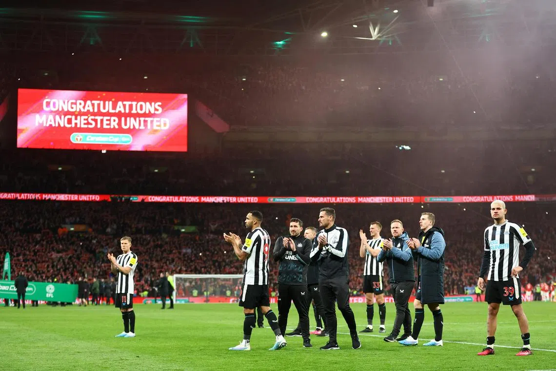 Newcastle United players looking dejected after losing the League Cup final 2-0 to Manchester United on Sunday.