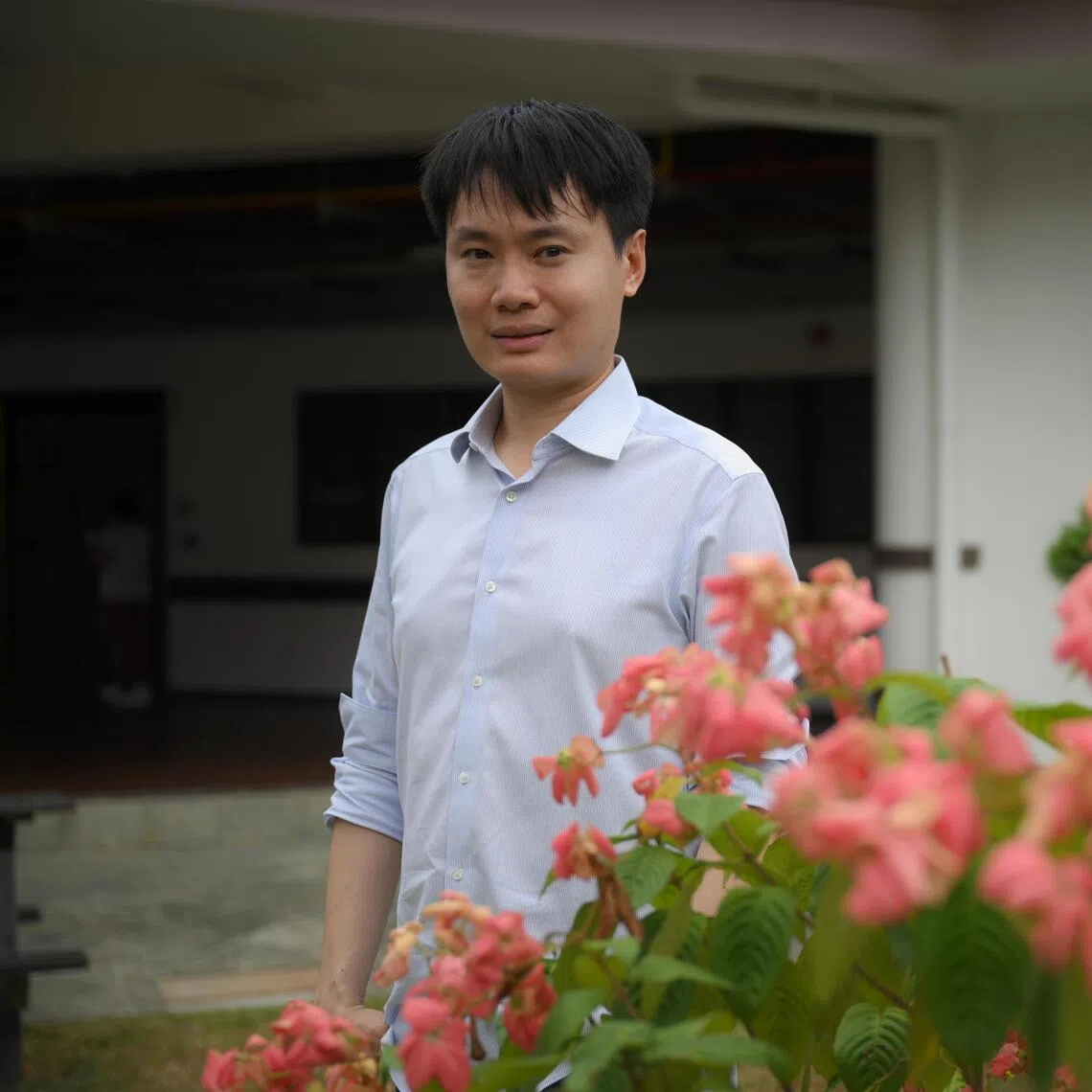 Mr Yong Kwon Seng, a volunteer at the Institute of Mental Health (IMH), befriends long-stay patients.