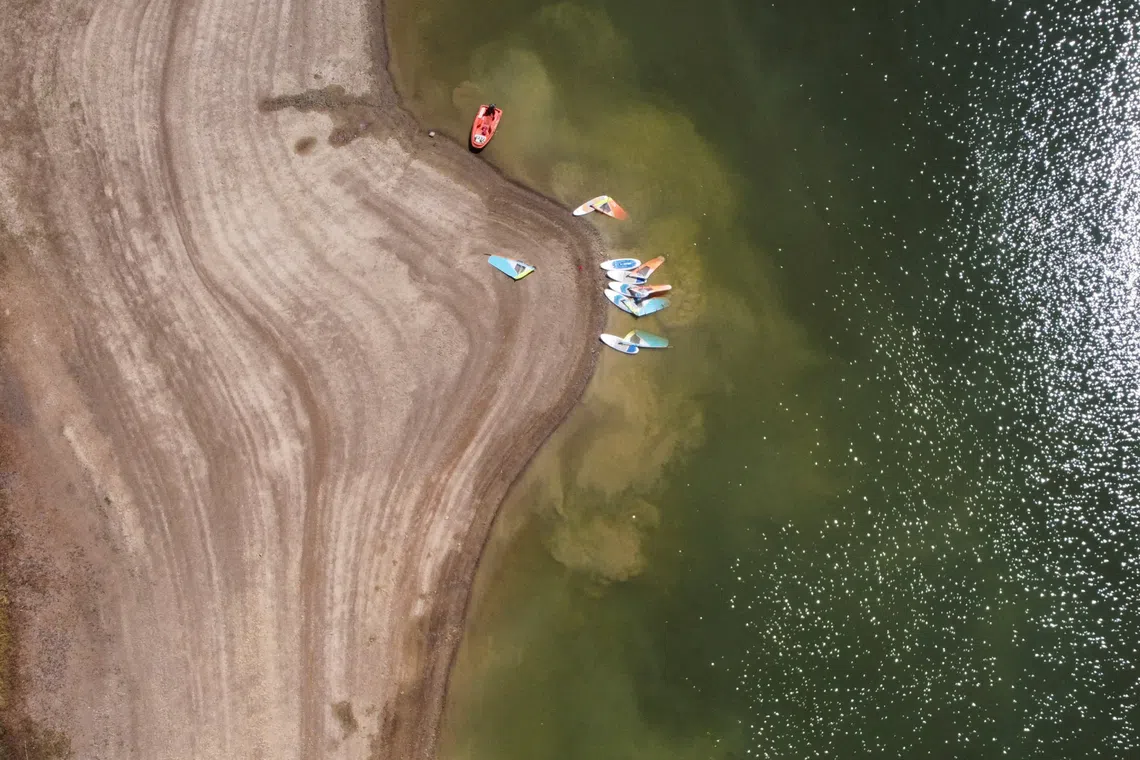 A drone view shows water levels receding at Ardingly Reservoir, West Sussex, after Britain’s Environment Agency declared drought conditions in several regions of the Midlands and South-east during the fifth heatwave of the year.
