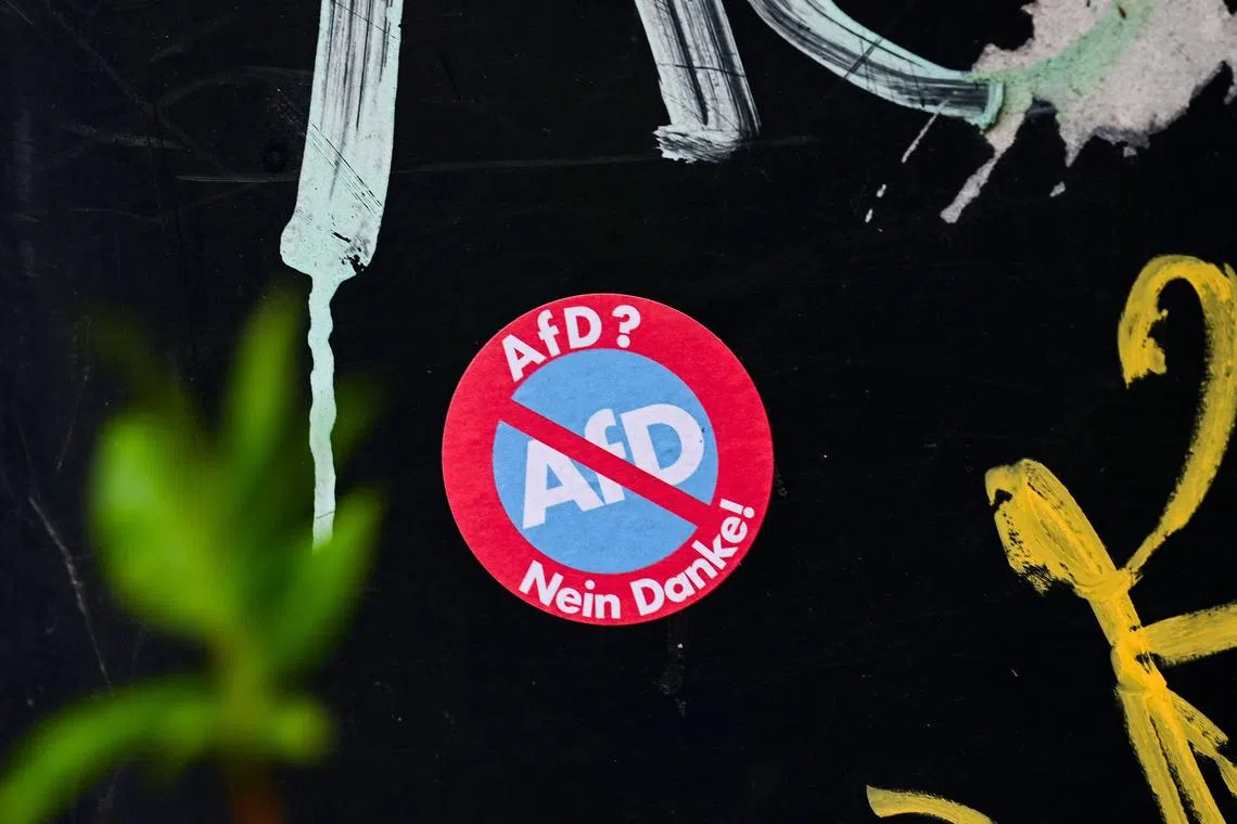A sticker which says "AfD (Alternative for Germany party) ? - No thanks!" The party, which has 78 of the 736 seats in the German federal parliament, maintains that it is a non-extremist formation, but its regional branches have already been formally declared extremist threats.