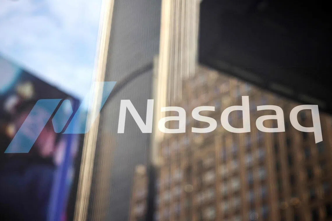 (FILES) This photograph shows the logo of Nasdaq headquarters in Times Square in New York City on January 30, 2025. The EU on November 6, 2025 announced a formal antitrust probe against stock exchange operators Nasdaq and Deutsche Boerse over "possible collusion" involving financial derivatives. (Photo by Yuki IWAMURA / AFP)