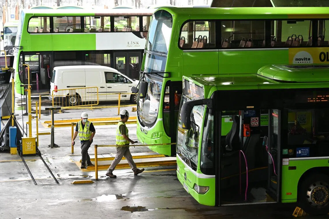 ST20230321-202373577289-Lim Yaohui-pixgeneric/
Go-Ahead Singapore buses at Loyang Bus Depot on Mar 21, 2023.
Go-Ahead Singapore is a leading local public transport operator and subsidiary of the Go-Ahead Group, a UK transport provider which enables more than one billion journeys a year.
It has 31 services, based at Loyang Bus Depot, serving Punggol Bus Interchange and Pasir Ris Bus Interchange. There are more than 1000 employees, including bus captains, technicial specialists, service controllers, traffic inspectors and corporate staff.
(ST PHOTO: LIM YAOHUI)