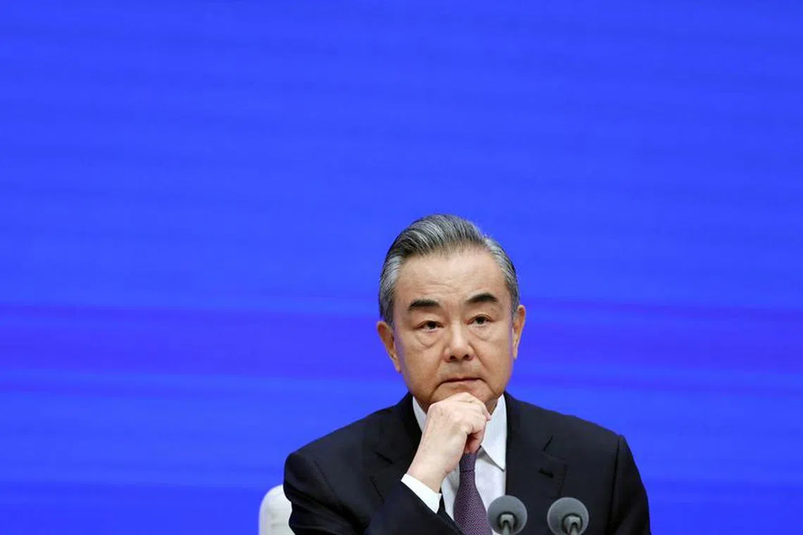 FILE PHOTO: Chinese Foreign Minister Wang Yi attends a press conference on the white paper on "A Global Community of Shared Future: China's Proposals and Actions", in Beijing, China September 26, 2023. REUTERS/Shubing Wang/File Photo