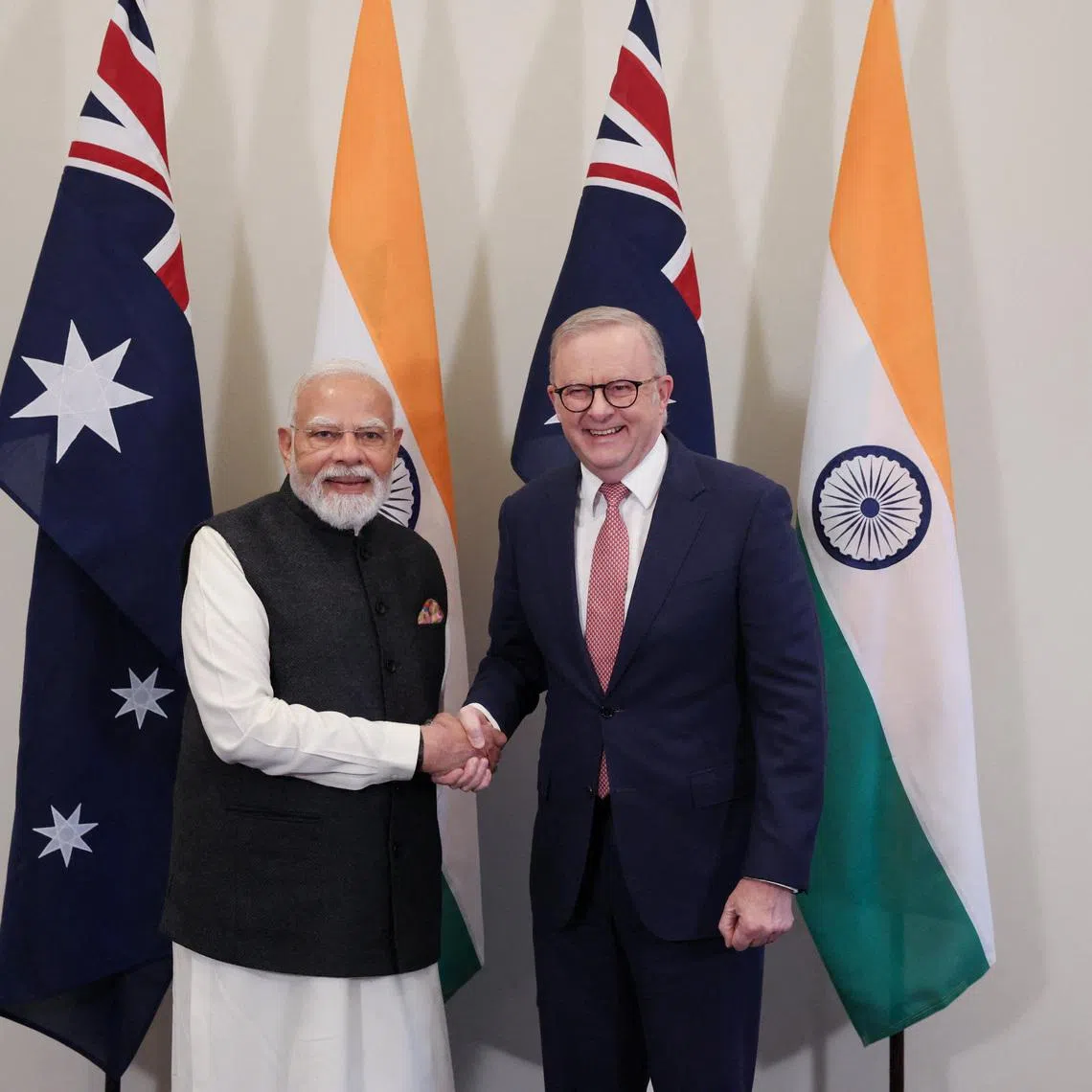 Australian Prime Minister Anthony Albanese and Indian Prime Minister Narendra Modi shake hands ahead of the CEO Forum and Economic Roadmap Business Reception in Melbourne, Australia, July 9, 2026.  REUTERS/Hollie Adams