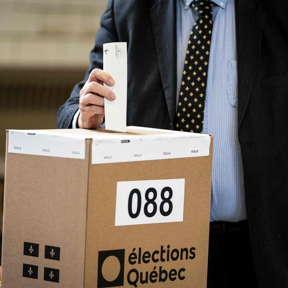 A person casts their ballot during Quebec’s provincial general election in Montreal, Quebec, Canada, on Oct 5.