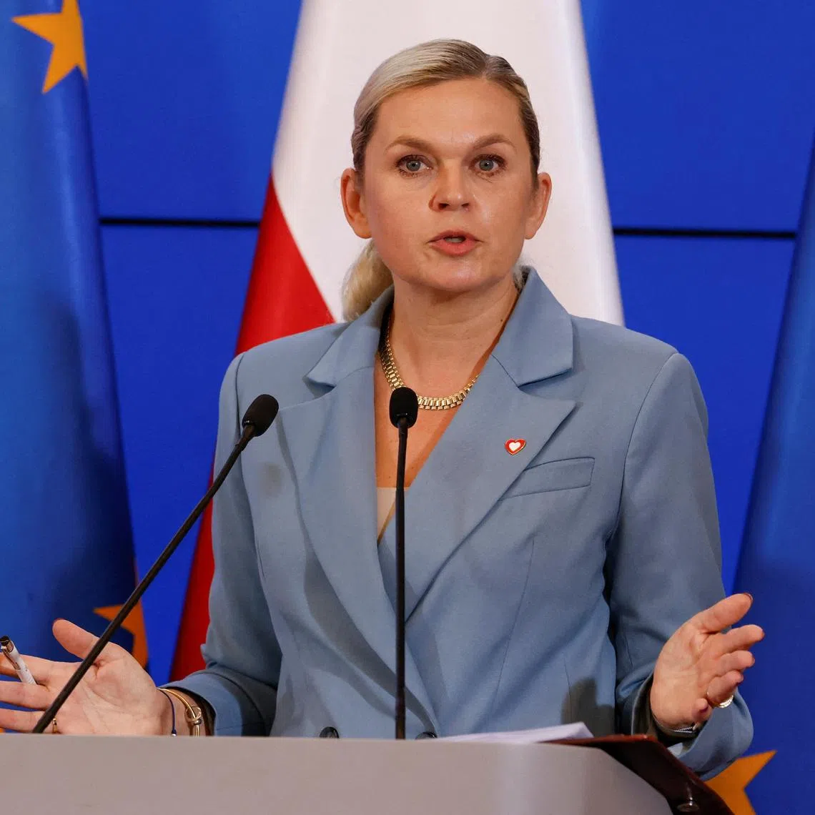 Poland's Minister of Education Barbara Nowacka speaks during a press conference on a government plan to ban mobile phones for under-16s in primary schools and introduce stricter age verification rules for accessing pornography, in Warsaw, Poland, June 2, 2026. The ban is set to take effect on September 1, 2026. REUTERS/Kuba Stezycki