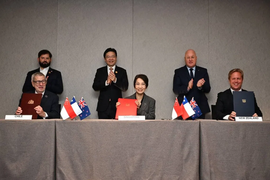 (Seated from left) Chile’s Minister of Foreign Affairs Alberto van Klaveren, Singapore’s Minister for Sustainability and Environment and Minister in Charge of Trade Relations Grace Fu and New Zealand’s Minister for Trade and Investment Todd McClay signing the Green Economy Partnership Agreement (Gepa) on Oct 31. Together with them are (standing from left) Chile President Gabriel Boric, Singapore PM Lawrence Wong and New Zealand PM Christopher Luxon looking.