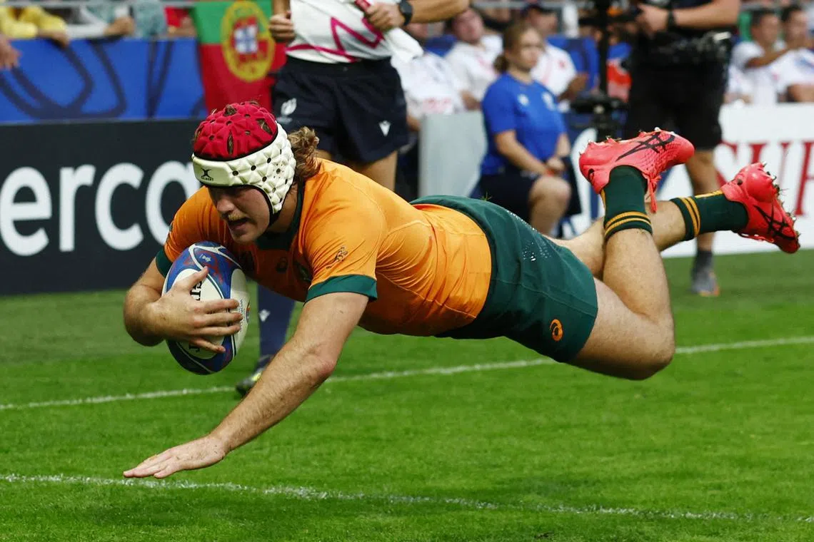 FILE PHOTO: Rugby Union - Rugby World Cup 2023 - Pool C - Australia v Portugal - Stade Geoffroy-Guichard, Saint-Etienne, France - October 1, 2023  Australia's Fraser Mcreight scores their fourth try REUTERS/Gonzalo Fuentes/File Photo
