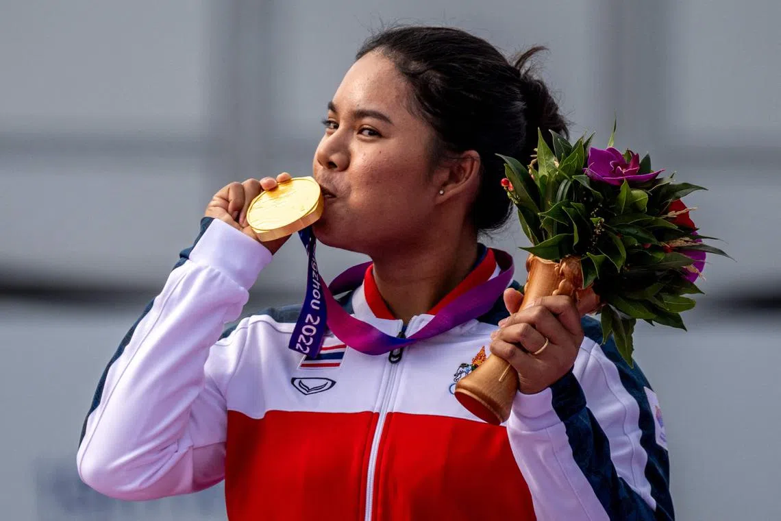 Thailand's Arpichaya Yubol celebrating with her gold medal after winning the women's individual golf event at the Asian Games on Oct 1.