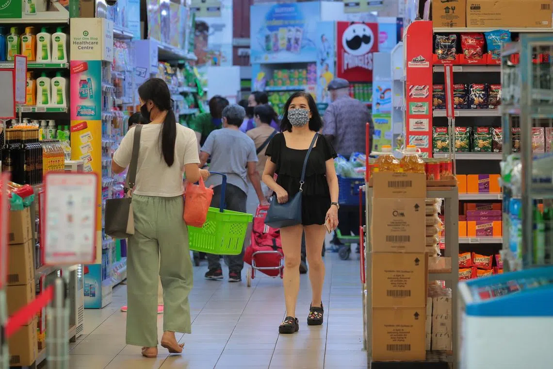 Shoppers at Sheng Siong supermarket at Tanglin Halt on Sept 27, 2021.