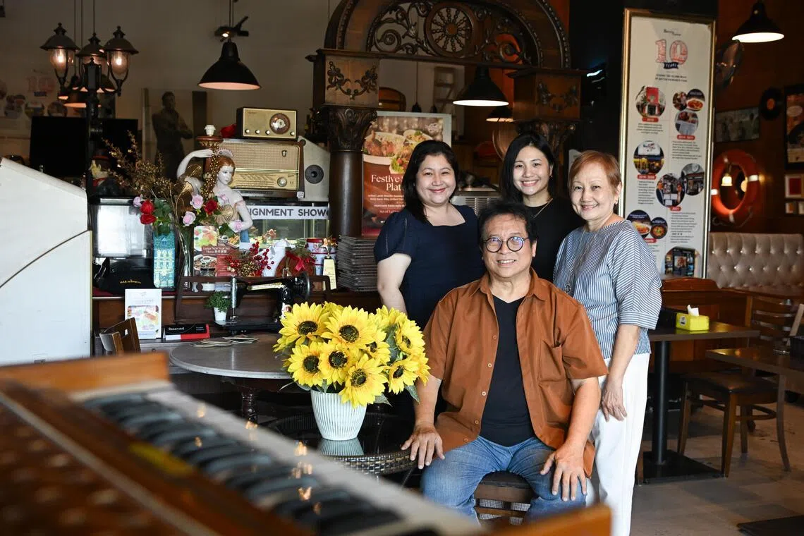 British Hainan is run by the Puah family – (anti-clockwise from front) Mr Frederick Puah, his wife Jessie Ng, and their daughters Vanessa and Amelia.