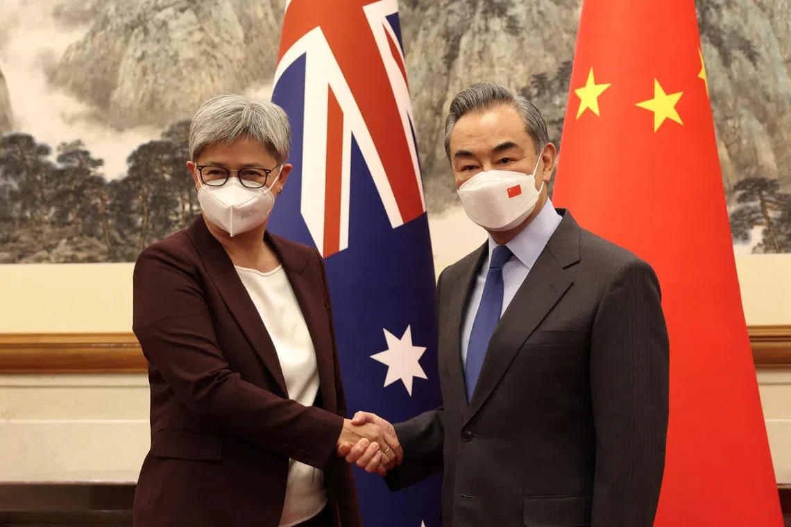 Australian Foreign Minister Penny Wong with her Chinese counterpart Wang Yi in Beijing, on Dec 21, 2022. 