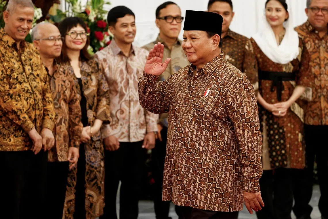 Indonesia's newly inaugurated President Prabowo Subianto gestures after announcing his cabinet ministers at the Presidential palace in Jakarta, October 20, 2024. REUTERS/Willy Kurniawan