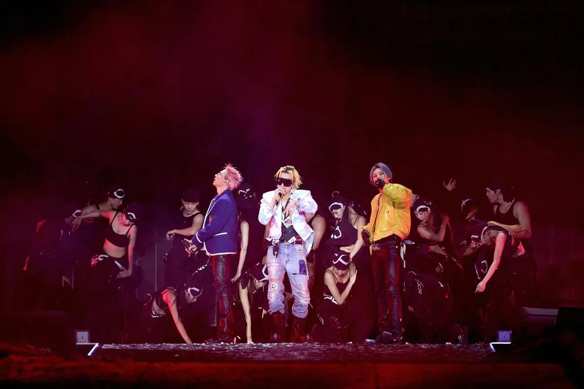 K-pop group BigBang, consisting of (from left) Taeyang, G-Dragon and Daesung, performing in East Rutherford in the United States on Sept 11.