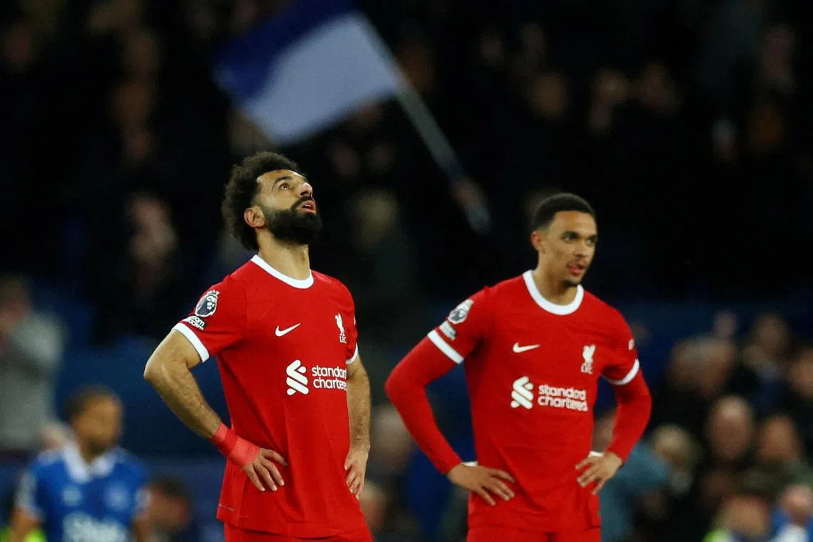 Liverpool's Mohamed Salah looks dejected after Everton's Dominic Calvert-Lewin scores their second goal.     