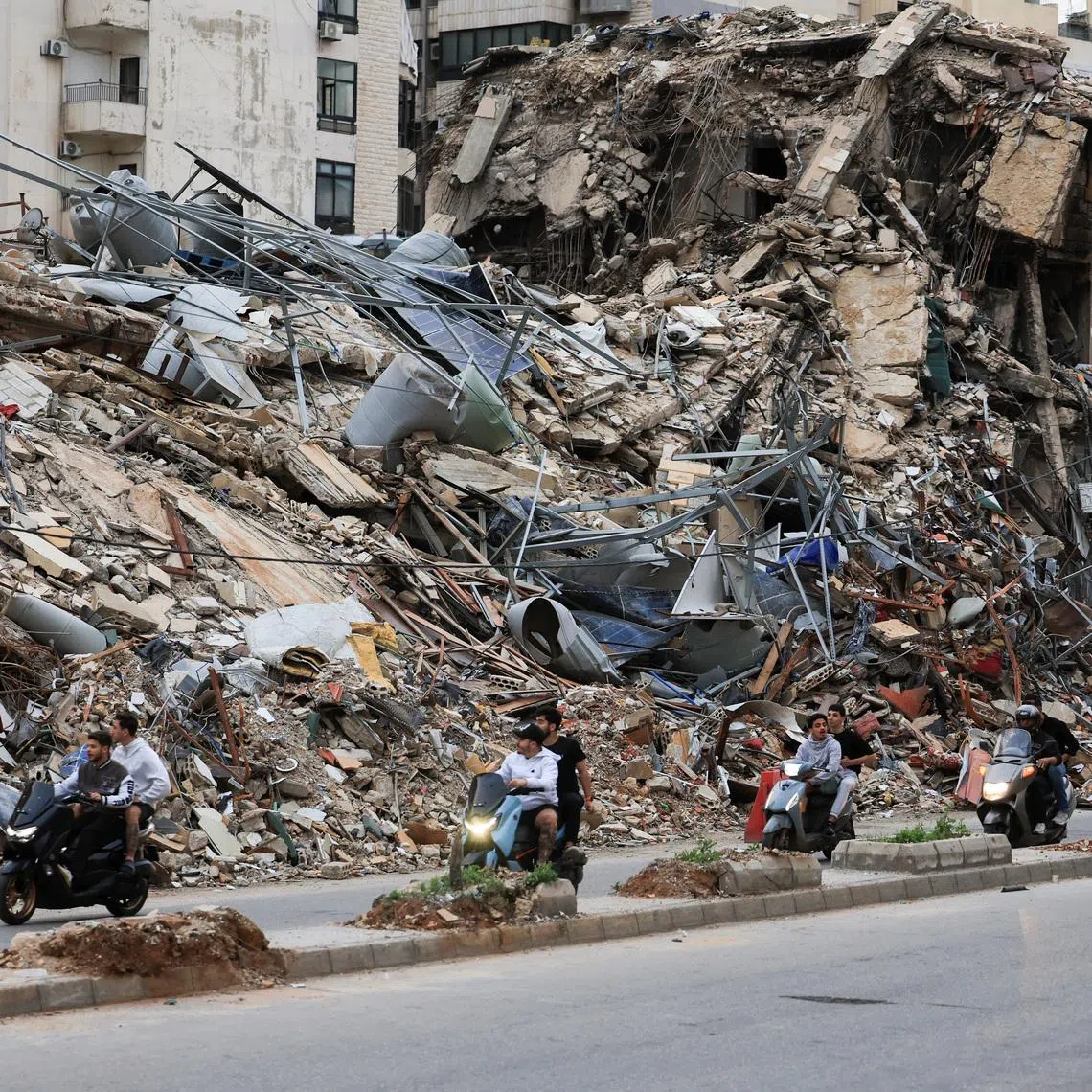 Displaced people make their way as they return to their homes after a 10-day ceasefire between Lebanon and Israel went into effect, at the southern suburbs of Beirut, Lebanon, April 17, 2026.