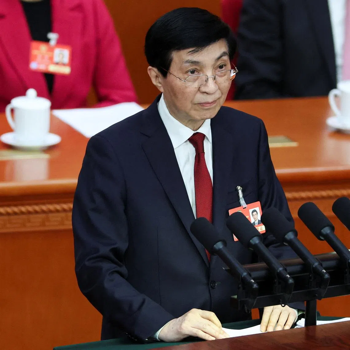 FILE PHOTO: Chinese People's Political Consultative Conference (CPPCC) Chairman Wang Huning speaks at the opening session of the Chinese People's Political Consultative Conference (CPPCC) at the Great Hall of the People in Beijing, China March 4, 2025. REUTERS/Florence Lo/File Photo