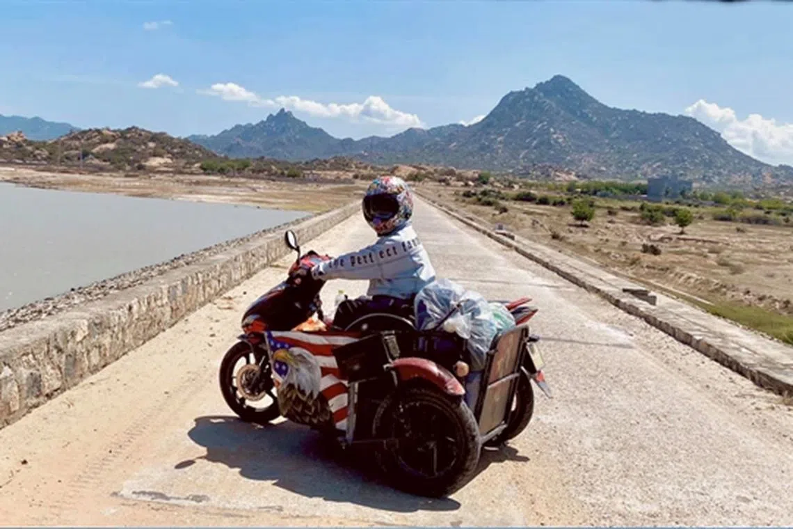 Mr Minh travelled to Ninh Thuan Province in 2021 in a three-wheeled scooter.