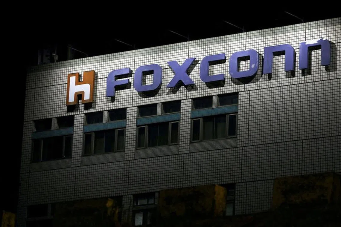 FILE PHOTO: The logo of Foxconn is seen outside the company's building in Taipei, Taiwan November 10, 2022. REUTERS/Ann Wang/File Photo