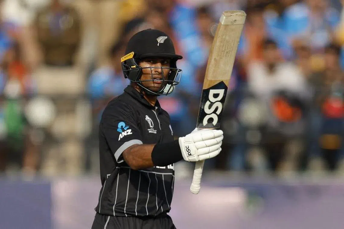 Cricket - ICC Cricket World Cup 2023 - India v New Zealand - Himachal Pradesh Cricket Association Stadium, Dharamsala, India - October 22, 2023  New Zealand's Rachin Ravindra celebrates after reaching his half century REUTERS/Adnan Abidi
