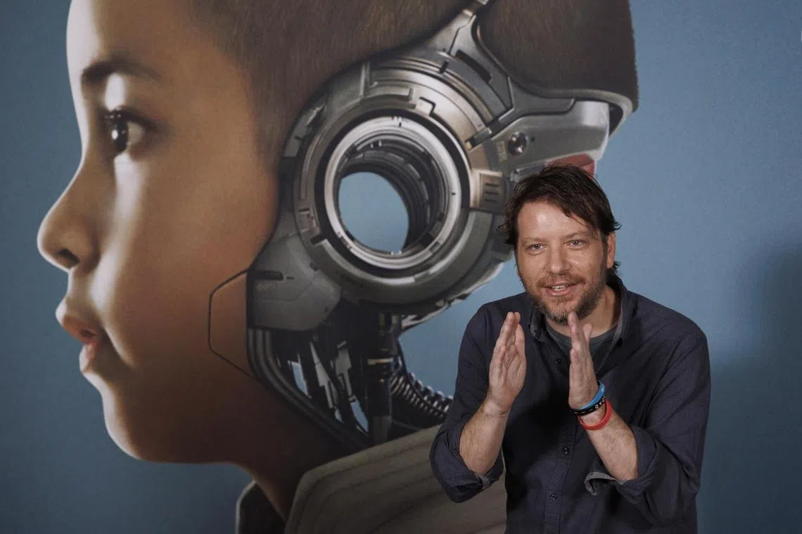 epa10876368 British filmmaker and script writer Gareth Edwards poses for the media during the presentation of his movie 'The Creator' in Madrid, Spain on 22 September 2023.  EPA-EFE/Sergio Pérez