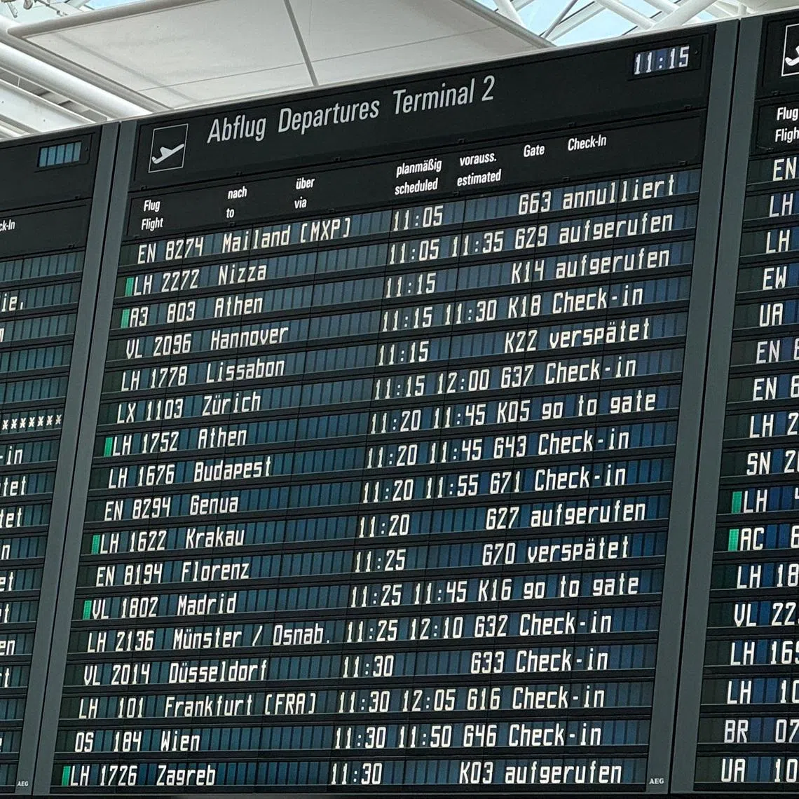 An information board showing cancelled and delayed flights at Munich Airport after a possible drone sighting on May 30.