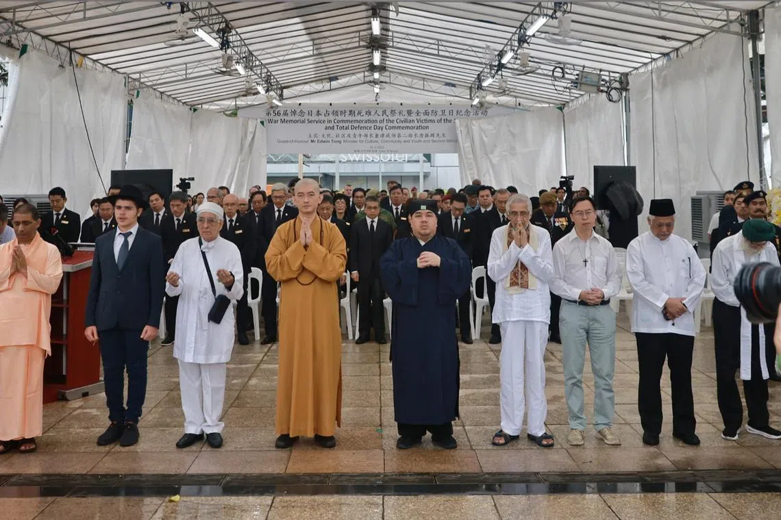 Representatives of the Inter-Religious Organisation holding prayers at a war memorial service in February.