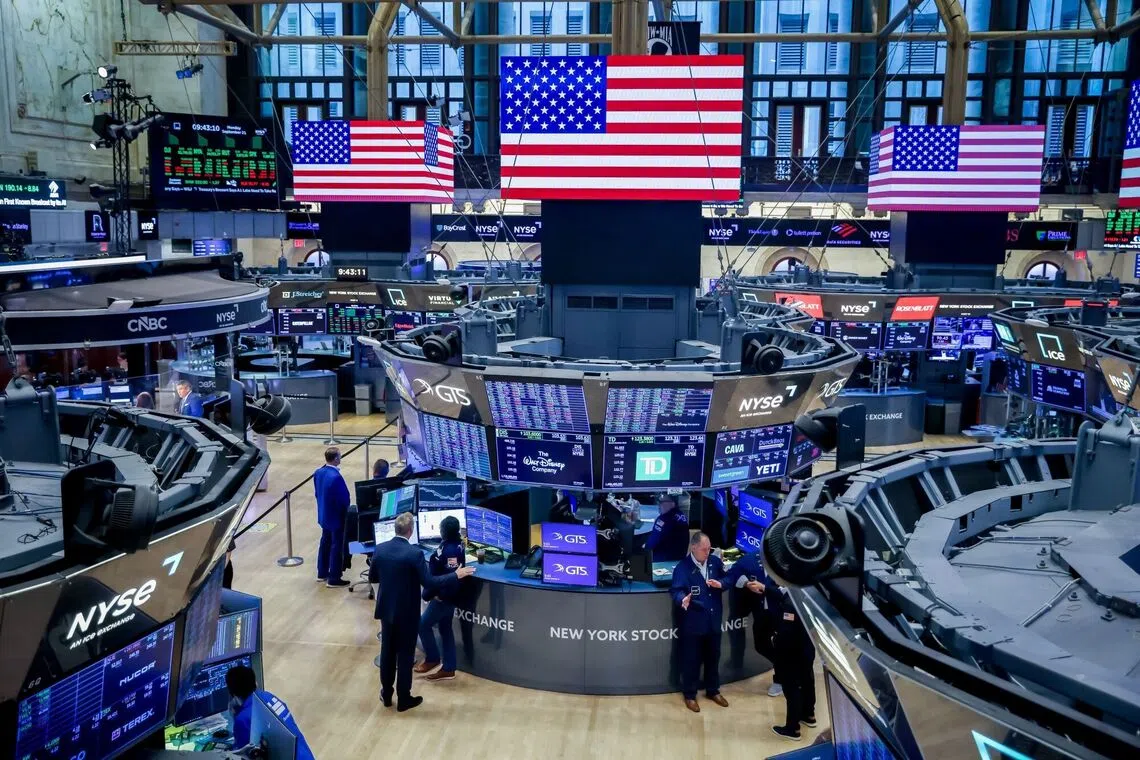 US flags on the floor of the New York Stock Exchange on Sept 21 in New York City.